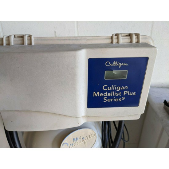 Culligan Medallist Plus Series Water Softener with a Carbon filter.  (Used)