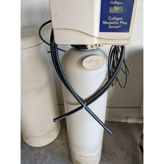 Culligan Medallist Plus Series Water Softener with a Carbon filter.  (Used)